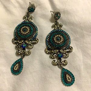 Turquoise rhinestone earrings. Worn by Miss AL.